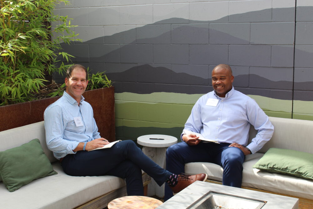 Two people seated casually