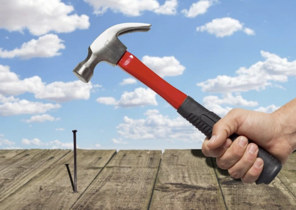 hammering the nail